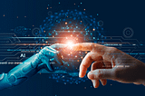 The image depicts a visual metaphor for the intersection of artificial intelligence (AI) and humanity. A robotic hand and a human hand are shown touching, reminiscent of the famous painting “The Creation of Adam,” symbolizing the connection between technology and humans. Surrounding the hands are digital graphics and symbols suggesting the transfer of knowledge or interaction between AI and human beings, highlighting the notion that technology is becoming an extension of human capability.
