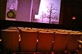 Alone in a movie theater by Studio Sarah Lou, Creative commons license via flickr