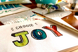 “Choose Joy” Written On A Paper