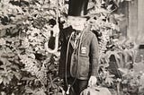 This is a black-and-white photo of the author, Gill McCulloch, taken by her father, Doctor Ken Warden, in 1969. Gill is dressed as Doctor Foster for a school play and is carrying her father’s medical bag and a black umbrella.