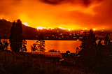 A forest fire burns in the Okanagan Valley lighting up the night sky.