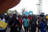 Michael Okpara Students Block The Road Umuahia — Ikot Ekpene Due To The Demise Of An Associate A…