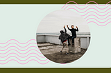 Green graphic with photo of two people high fiving on a roof