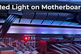 A bright red light on the motherboard indicating that there is a problem somewhere