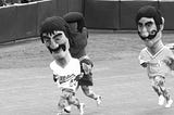 Baseball Mascots Running. Photo by Mark Tulin.