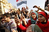 The Arab Spring: Online Activism to Offline Protest