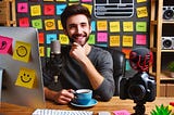 a person sitting with a cup of tea