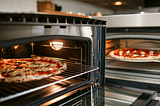 Home vs. Business Ovens: Why High Heat is Crucial for Perfect Pizza