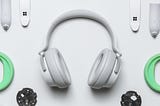 Varying headphone pieces in a scattered array.