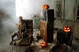 A skeleton sitting in a chair watching tv, in a room covered in spiderwebs.