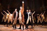 Jamael Westman, centre, plays Alexander Hamilton at the refurbished Victoria Palace in London (photo: Matthew Murray)