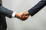 Two people shaking hands