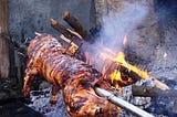 How to Roast a Whole Pig on a Spit the Balkan Way