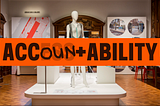 The Cooper Hewitt Access+Ability Logo has been altered. The letters E S S are covered up by “OUN” and the plus sign now represents a T. So it reads Accountability rather than Access+Ability