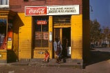 Schulman’s Market Washington DC. A woman and a little girl standing in front