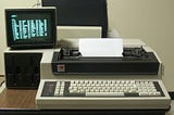 Picture of a Durango early desktop computer with built-in printer, keyboard and monitor off to one side.