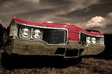 red car with sepia background