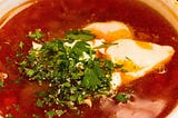 Close up picture of a bowl of borscht