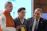 January 19, 2024 — Honourable Governor of Gujarat Shri. Acharya Devvrat and LMP President Shri Satish Vithlani presented the 2024 International Artist of the Year Award to Tushar Unadkat.