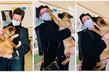 Three photos of me (a white female with short brown hair, a mask, and reddish gold round glasses) holding a squirmy German Shepherd mix puppy. In the first photo, he is curled up in a ball, nibbling on the straps of my purse. In the middle photo, his left paw is placed squarely on my left temple while his tongue sticks out. On the right, he is kissing my left cheek while I laugh. I am wearing a black wool coat, scarf, backpack, and purse with pink and gold accents w/ animal posters behind me.