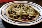 Black bean tostadas with creamy green salsa