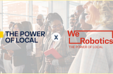 Photo of people conversing and laughing, with The Power of Local Challenge and WeRobotics logos in the front, prominently displayed.