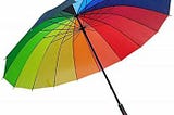 Umbrella with the coulours of the raibow; white background.