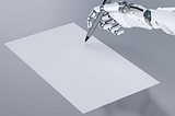 Image of robotic hand writing on a piece of paper