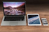 Photo of MacBook, iPad, and iPhone. Photo by Pixabay: https://www.pexels.com/photo/macbook-pro-beside-white-ipad-4158/