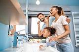 Whole Family Doing Burshing and Represent the Oral/ Dental Health