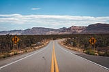 Photo by Enric Cruz López: https://www.pexels.com/photo/asphalt-road-through-cactus-fields-in-mountainous-valley-6039250/