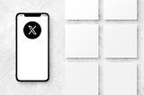 A phone with the X social media icon on it with blank white squares next to it