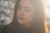 A close up beautiful woman outdoors.