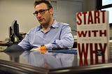 Simon Sinek at Travis Air Force Base with his book Start with Why
