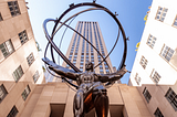 Sculpture of Atlas in front of Rockefeller Center. Photo by David Vives on Unsplash.
