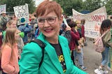 Sarah Iannarone smiling at a protest