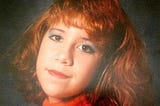 A picture of the author in 1988, complete with orange hair and garish makeup.
