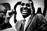Stokely Carmichael smiling.