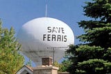 ‘Save Ferris’ written on a water tower