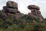 A hill in Jos called Shere Hill that has disproportionately natural stacked up rocks.