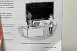 Cartoon of a teacher sitting at her desk in a classroom. A boy is handing her a piece of paper and says My homework is late because of supply chain issues.