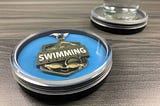 https://www.kudos2u.com/product/swimming-medal-display-coaster/