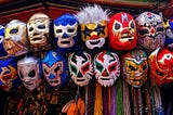 A colorful display of wresting masks.