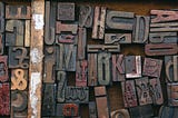 A collection of antique wood letter blocks