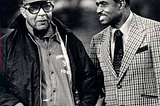 Tennessee State Coach John Merritt and Grambling Coach Eddie Robinson before a football game.