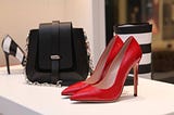 pair of shoes and handbag in a fashion store