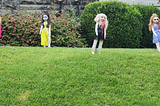 Scary dolls on the lawn