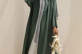 Women Wearing Green Abaya