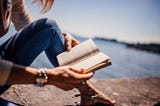 Woman reading a non-fiction book