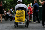 A man in a wheelchair protesting police terror against people with disabilities | Source: The New York Times (NYT)
